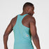 mens light blue saysky singlet with reactive fabric that shows saysky pattern when wet, man wearing shirt with close up on back shoulders