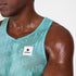 mens light blue saysky singlet with reactive fabric that shows saysky pattern when wet, wet fabric close up on logo