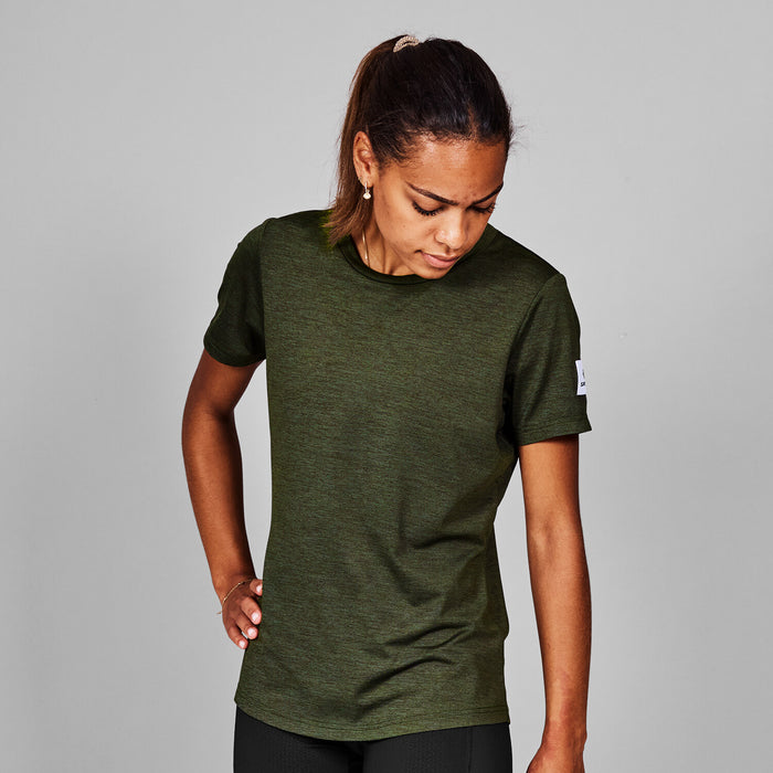 saysky clean pace t-shirt for women, quick dry, soft running t-shirt, dark green colour,  woman wearing green saysky running top on a white background