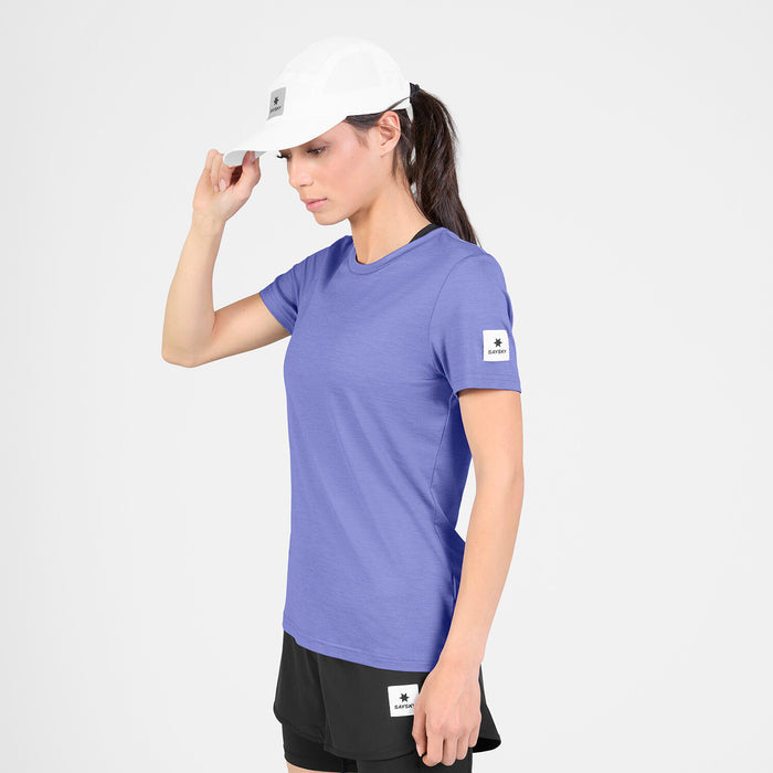 saysky clean pace t-shirt for women, quick dry, soft running t-shirt, light purple colour,  full body view of woman wearing saysky running top with a white cap and black shorts on a white background