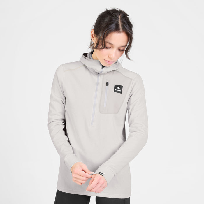 SAYSKY womens combat half zip fleece hoodie, warm and lightweight longsleeve fleece for running, grey colour with black SAYSKY logo, woman wearing fleece hoodie on a white background
