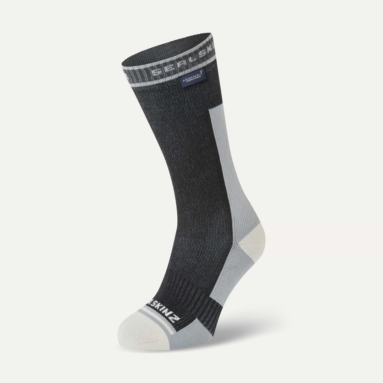 Sealskinz holverstone waterproof running sock gray and white with brand logo on a light gray background