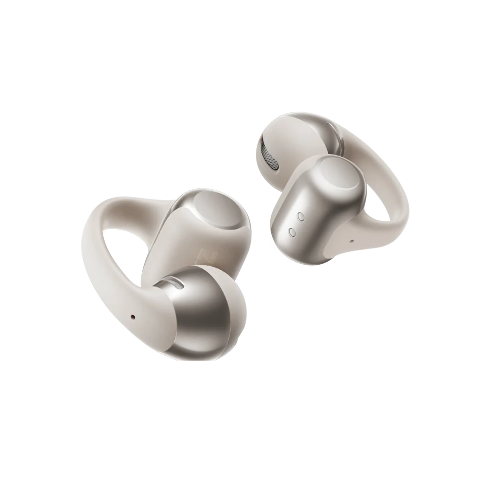 Pair of silver grey wireless shokz earbuds close up