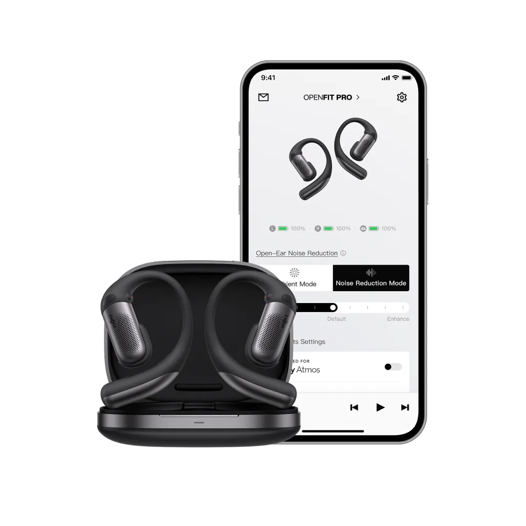 Black OpenFit Pro wireless earbuds shown with their charging case in front of a smartphone displaying the OpenFit Pro app