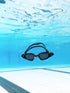 Zoggs spectra goggles, tinted smoke lens, floating in pool