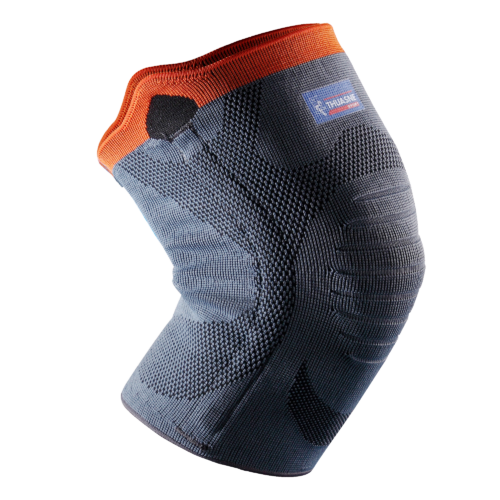  Thuasne knee support for knee pain and/or swelling management, grey / orange colour, close-up of knee support
