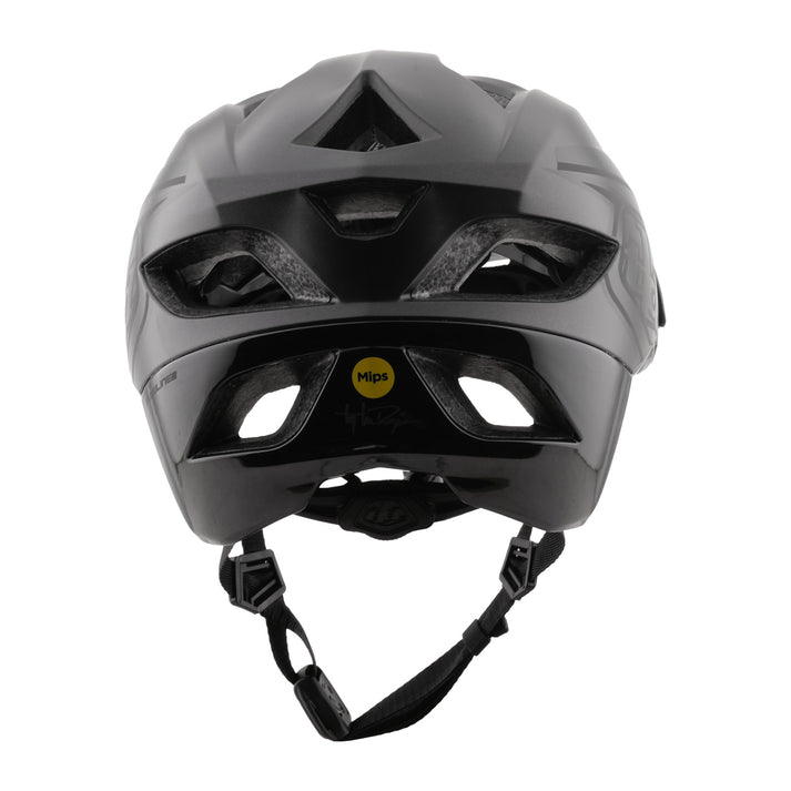 troy lee designs flowline se black matte mtb helmet with visor, back of helmet with mips sticker