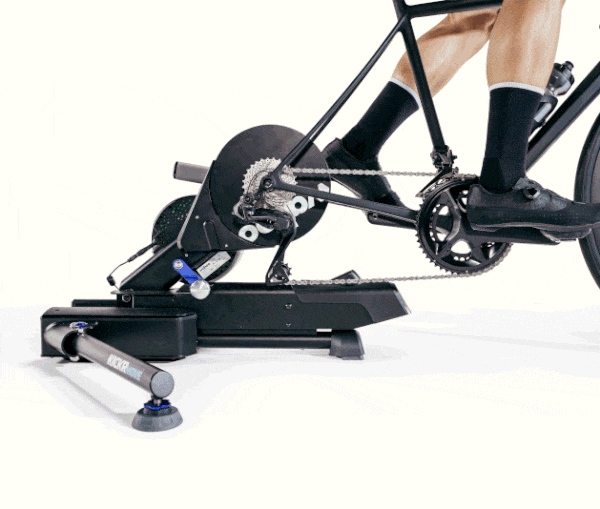 wahoo kickr move bike trainer, bike trainer with side to side movement, black cycling trainer in use