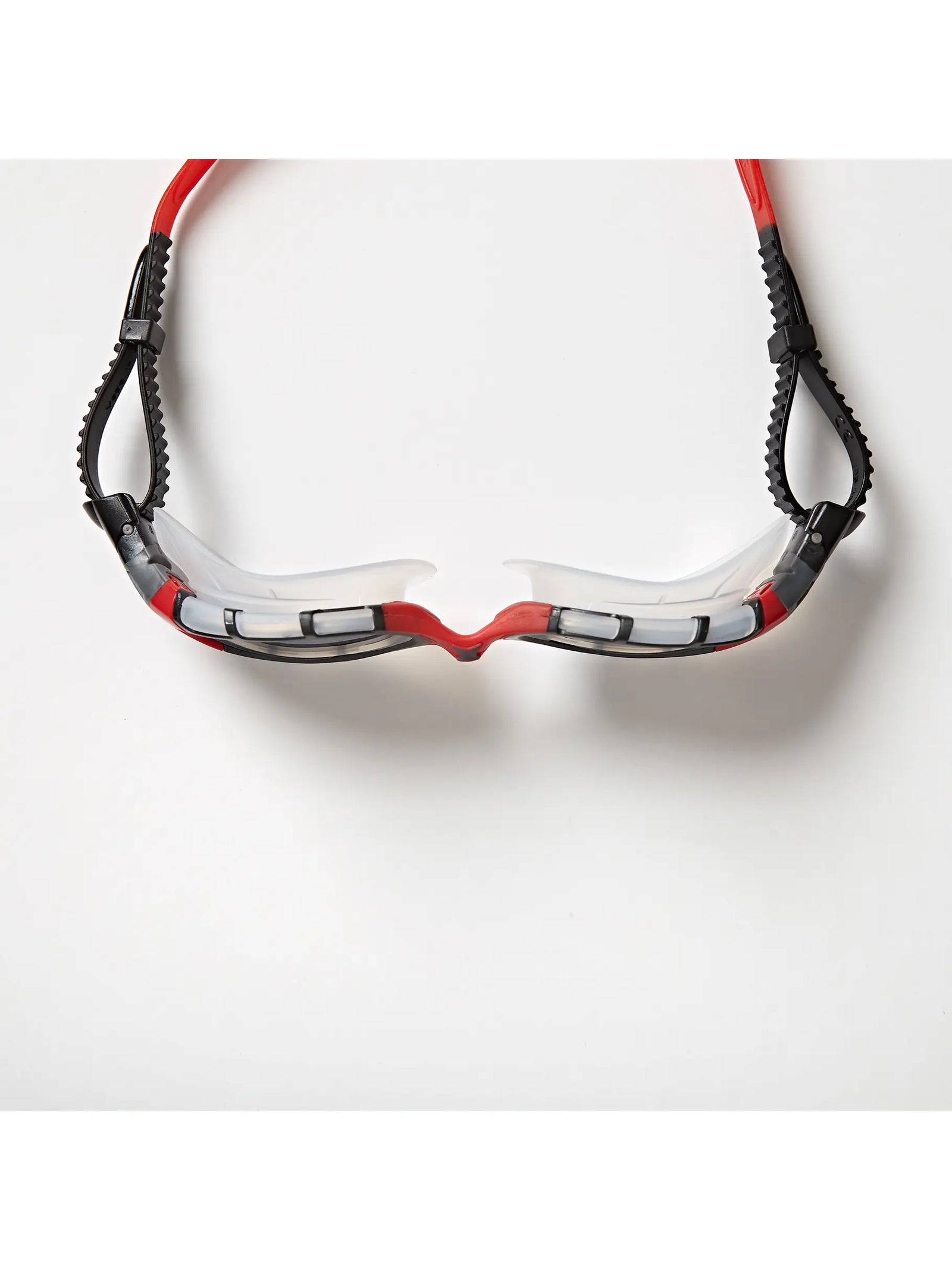 Zoggs predator flex titanium goggles, clear gasket, red strap and nose bridge, smoke lens, top view